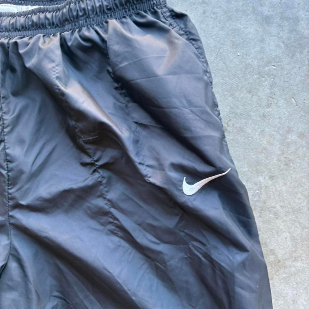 Vintage 90's black Nike tracks with zipper opening super high‎ quality